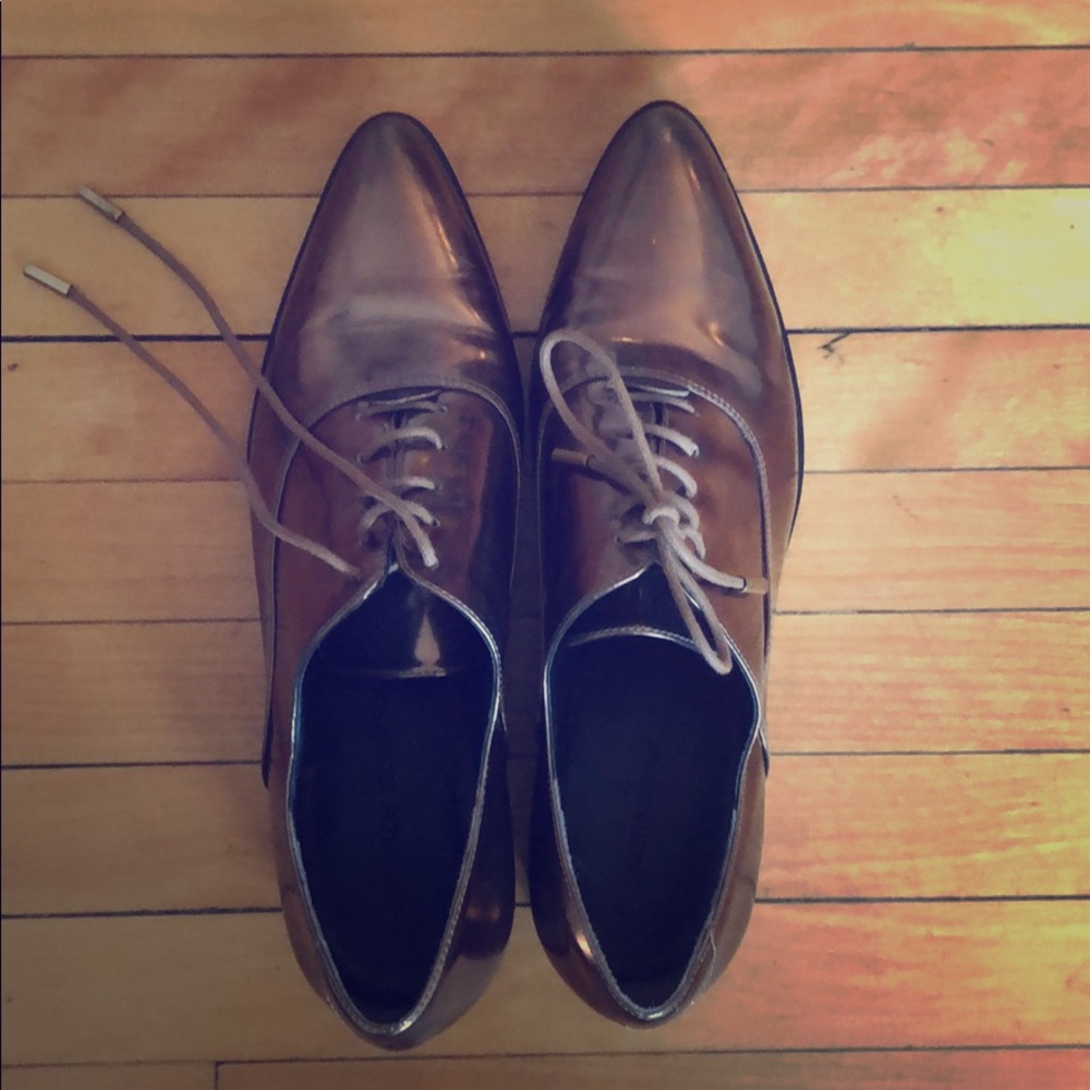 Never-worn shiny copper women’s dress shoes